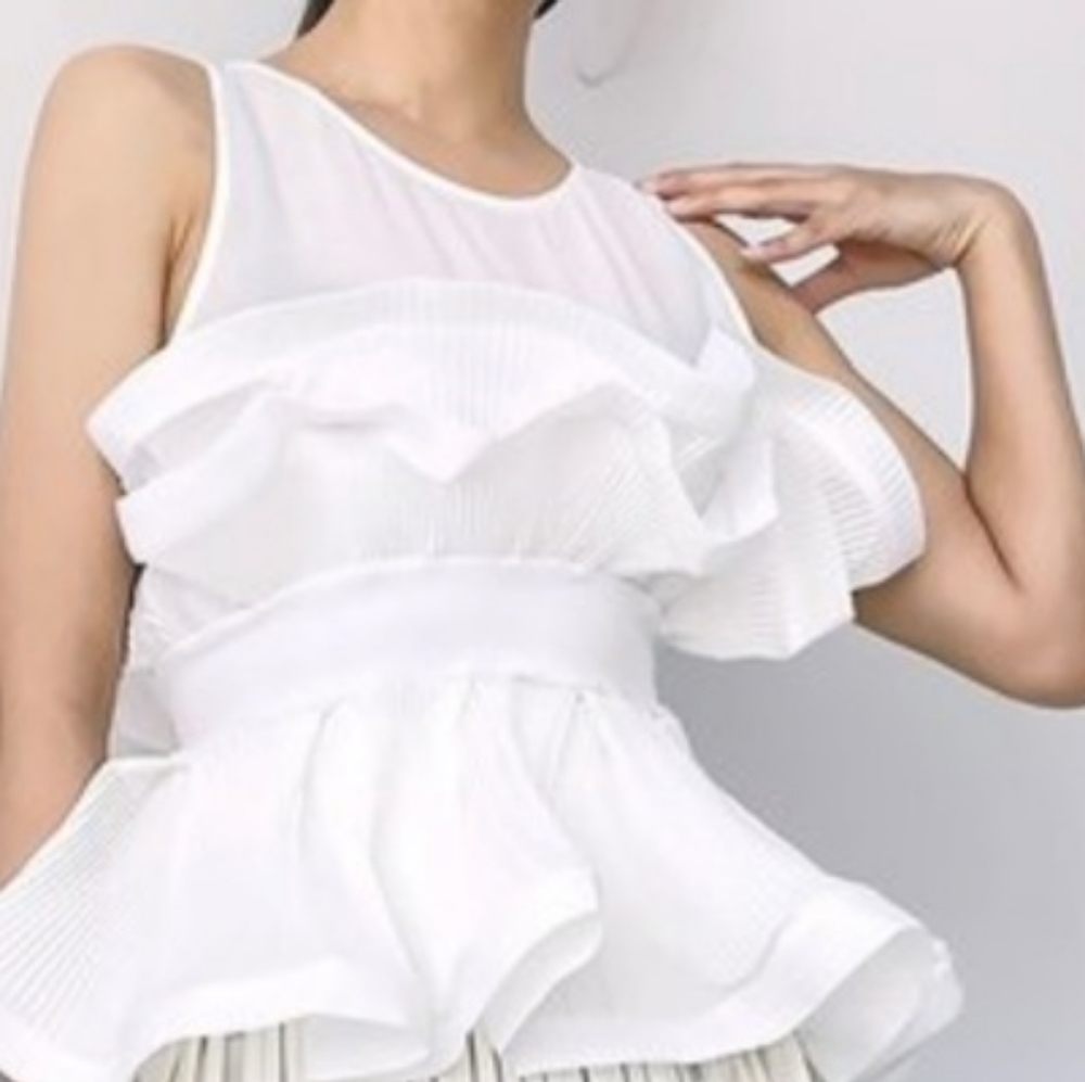 White peplum top